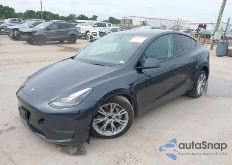 2024 Tesla Model Y z USA, uszkodzony, nr VIN 7SAYGDED6RF092556